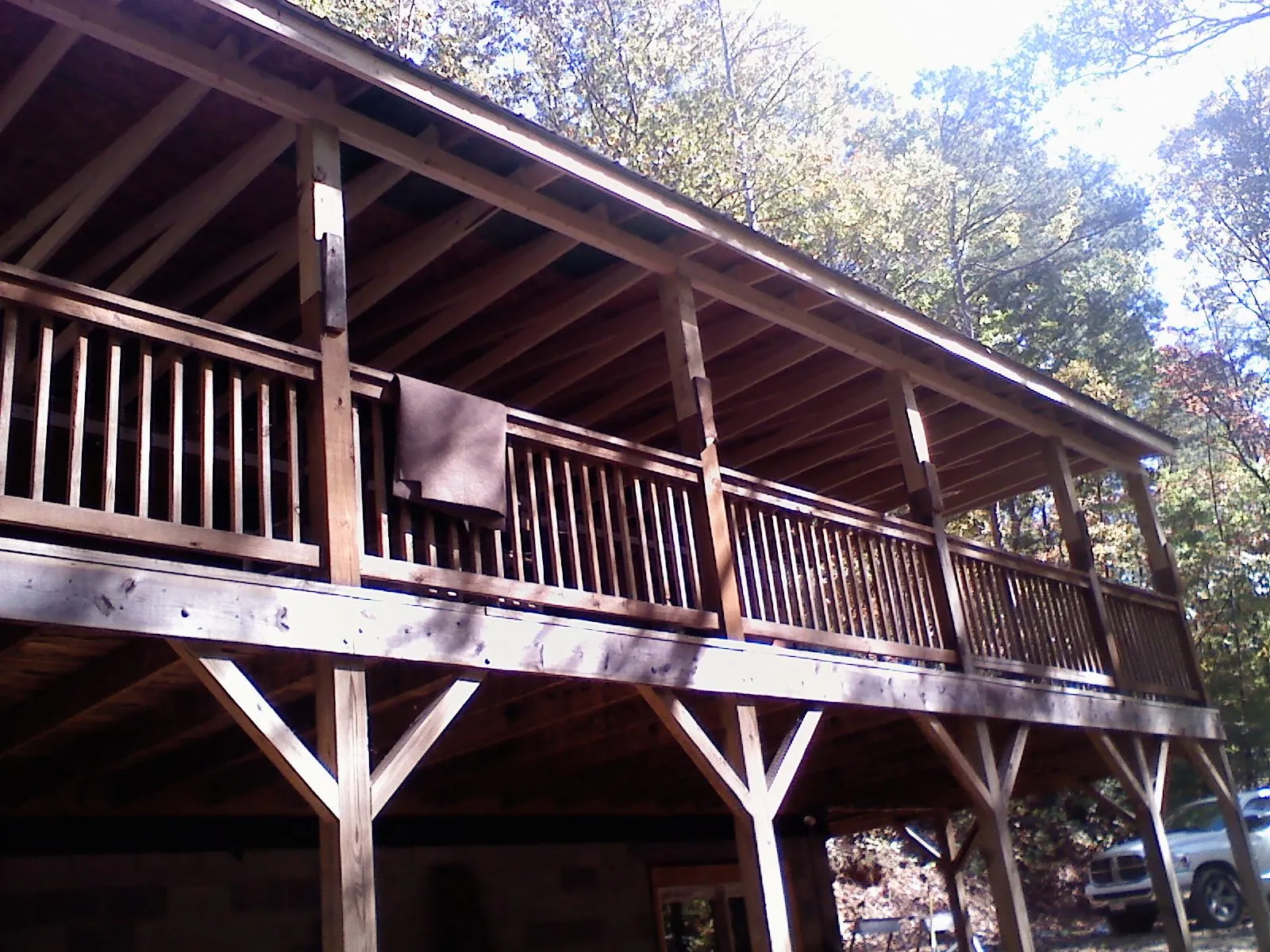 Timber framing under a new elevated porch and deck — Roof Leak Repair in Carey by Roofing Brothers